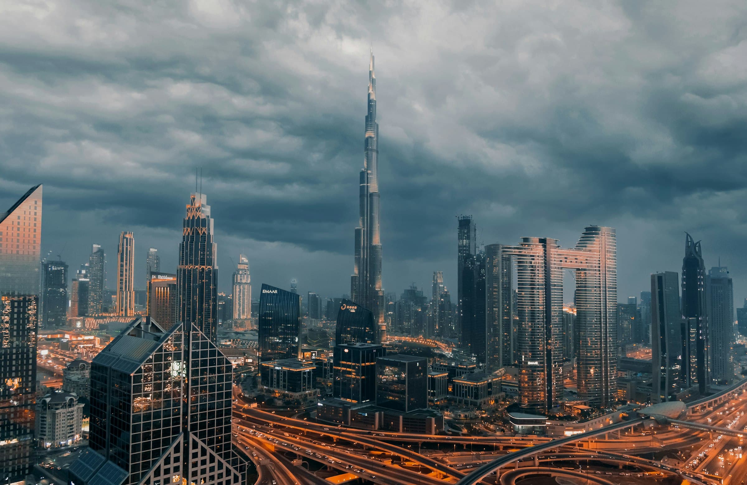 Dubai skyline with the Burj Khalifa and Sheikh Zayed Road at dusk